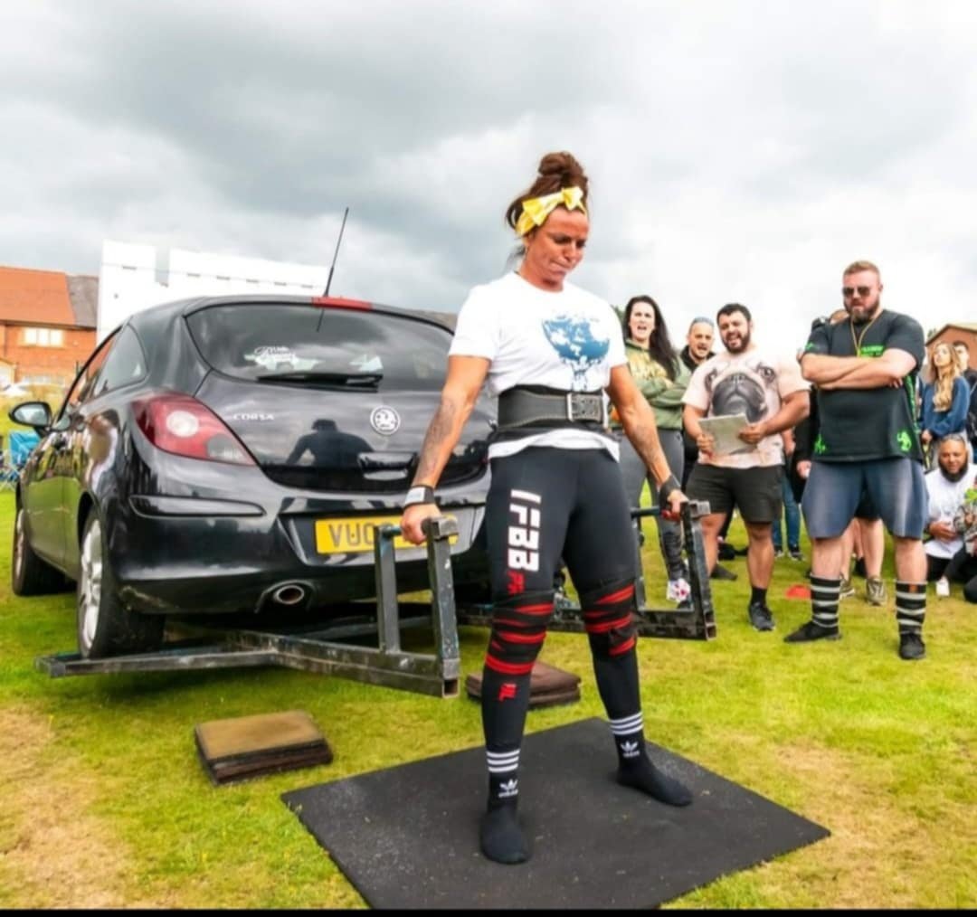 Jayne competing in Strongman